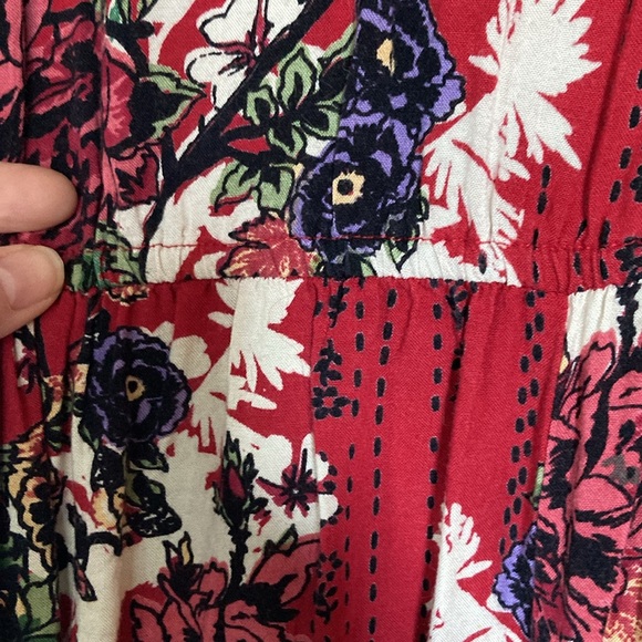 ANGIE Wide Leg bohemian floral jumpsuit with flirty peak a boo twist tie on top - Picture 9 of 13